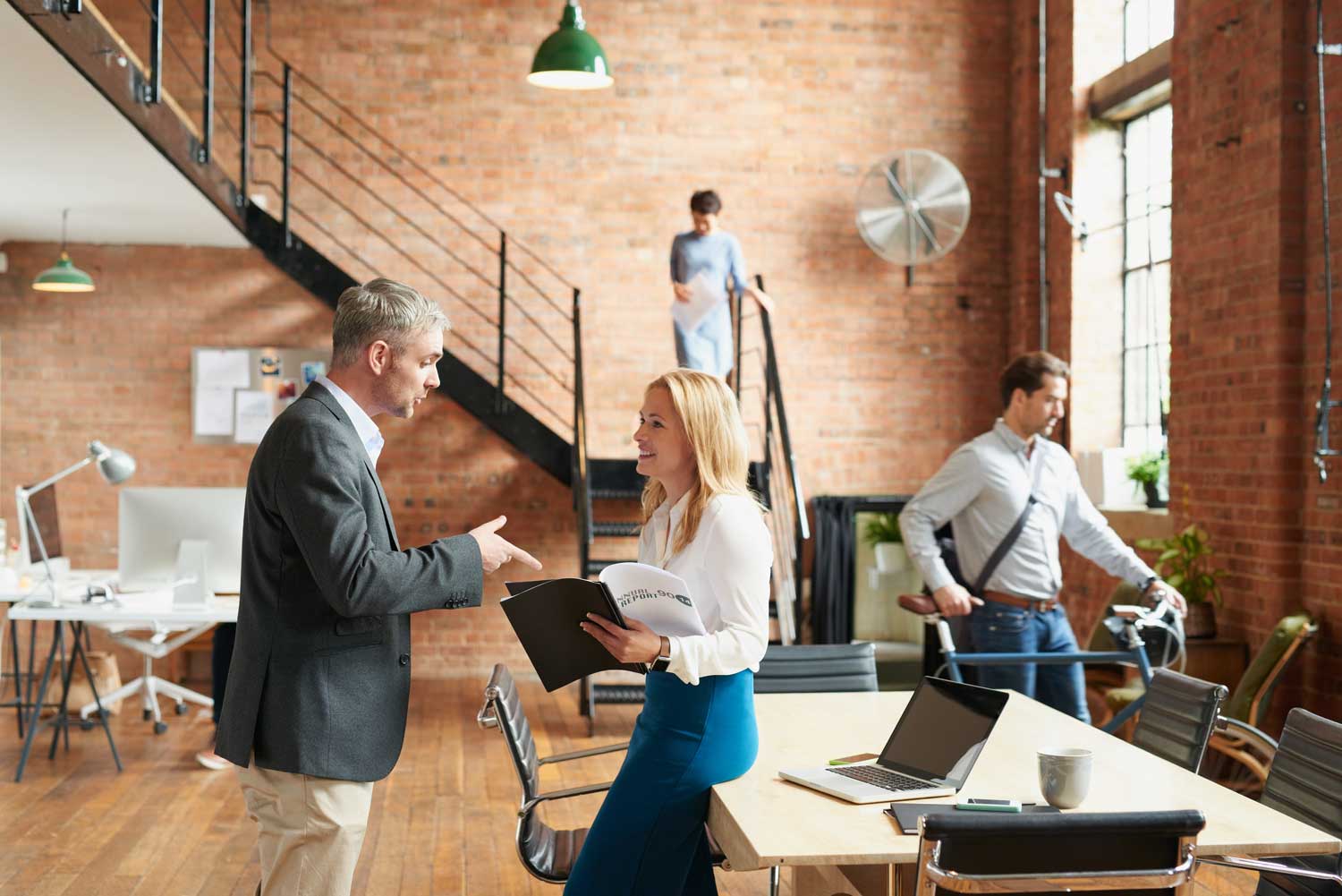 meeting in busy trendy office with business people meeting in busy trendy office with business people
